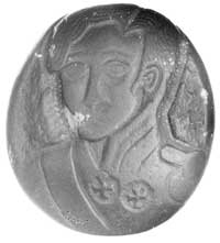 płaskorzeźba w brązowym kamieniu przedstawiająca oficera z orderami na piersi, kamień 46 x 51 mm, ..