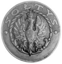 okrągła, odznaka sołtysa, na mosiężną tarczę nałożony orzeł mosiężny srebrzony, sygnatura na odwro..