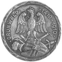 medal grunwaldzki autorstwa Marcina Jarra 1910 r., Aw: Orzeł siedzący na pękniętej tarczy krzyżack..