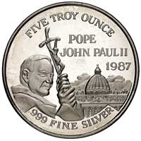 medal z wizyty Jana Pawła II w USA w 1987 roku, Aw: Papież trzymający pastorał na tle budynku Kong..