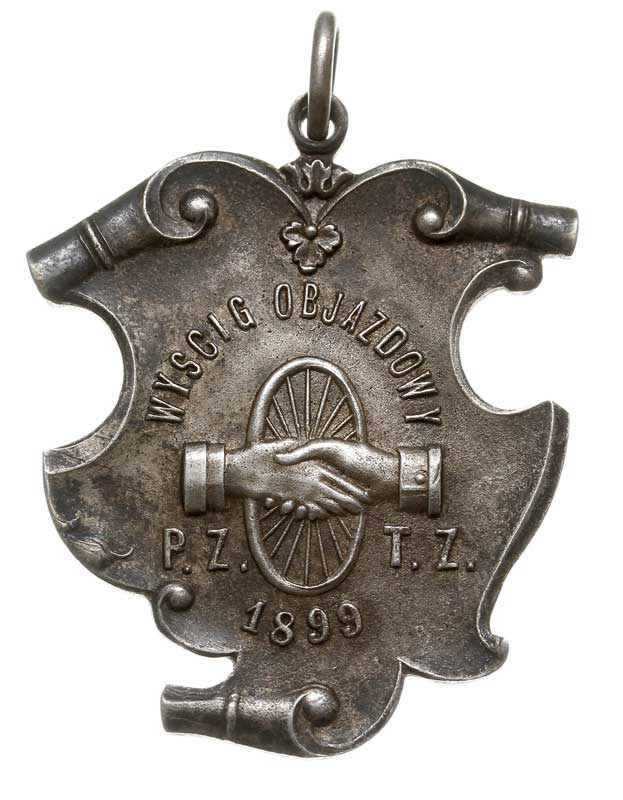 Odznaka Pamiątkowa z wyścigu objazdowego PZTZ 1899, srebro 13.85 g, 40 x 33.4 mm, na stronie odwrotnej rysy