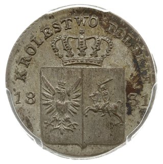 10 groszy 1831, Warszawa, odmiana z prostymi łapami Orła, na rewersie nad wiązaniem wieńca 2 małe  gałązki
