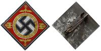 Niemcy, prostokątny znaczek na blaszce cynkowej z agrafką, symbol faszyzmu ''swast..