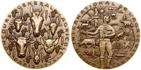 medal nagrodowy 1974, Aw: Głowy zwierząt, między