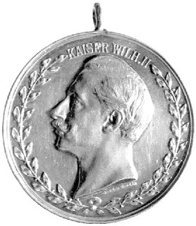medal na 25-lecie panowania Wilhelma II wybity w 1913 r., Aw: Popiersie Wilhelma II w lewo, wokół wieniec dębowy i napis: KAISER WILH. II, sygn. OERTEL BERLIN, Rw: Średniowieczna korona cesarska na szarfach i liściach dębowych, napis poziomy: ZUM 25-JÄHR-REGIERUNGS-JUBILÄUM 1888 1913, niżej IN TREU FEST, srebro 35,5 mm, 15,99 g.