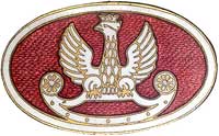 odznaka patriotyczna w kształcie mosiężnej broszy, na czerwono emaliowanym polu biało emaliowany O..