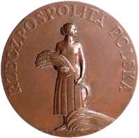 medal nagrodowy Za Pracę, autorstwa E. Wittyga 1926 r., Aw: Orzeł z rozpostartymi skrzydłami i kło..