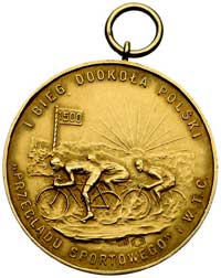 medal złoty sygnowany A Nagalski przyznany przez