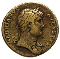 Hadrian 117-138, sestercja, Aw: Popiersie w prawo, Rw: Stojący Virtus w lewo, prawą nogą depczący ..