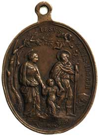 medal religijny z uszkiem, Aw: Trzy postacie i napis od góry JESVS. MARIA. JOZEF, Rw: Klęczący świ..