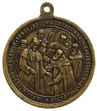 medalik okrągły z uszkiem z sygmaturami WYK. F. 