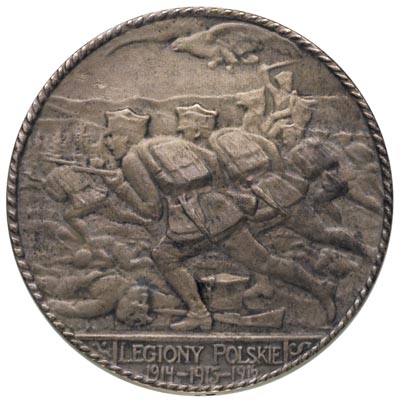 medal autorstwa Jana Wysockiego-Legiony Polskie 1916 r., Aw: Piechota w ataku na bagnety, w odcinku 1914-1915-1916, Rw: Przy kowadle dwie nagie postacie