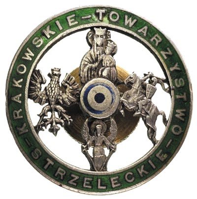 Odznaka Krakowskiego Towarzystwa Strzeleckiego, mosiądz srebrzony, średnica 32 mm, niebieska i zielona emalia, brak korony wieńczącej odznakę