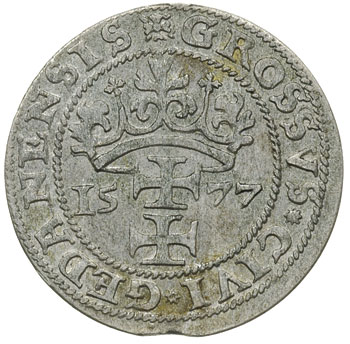 grosz oblężniczy 1577, Gdańsk, moneta bez kawki wybita w czasie gdy zarządcą mennicy był K. Goebl, na awersie głowa Chrystusa nie przerywa wewnętrznej obwódki, na początku i na końcu napisu gwiazdki, T. 2.50