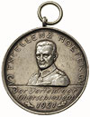 Głogówek, medal z uszkiem na 700-lecie miasta, Aw: Popiersie trzyczwarte w lewo i napis powyżej EX..