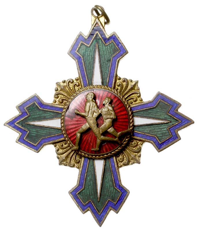 Odznaka Pamiątkowa w kształcie krzyża Za Biegi Przełajowe, mosiądz 55.4 x 48 mm, emalia, na stronie odwrotnej napis ZA PRZEŁAJ