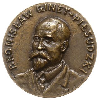 medal autorstwa Konstantego Żmigrodzkiego z 1918 roku poświęcony Bronisławowi Ginet-Piłsudskiemu, Aw: Popiersie trzy-czwarte w lewo, BRONISŁAW GINET-PIŁSUDZKI, Rw: Wyspa Sachalin, nad którą orzeł z rozpostartymi skrzydłami na wprost, poniżej \KRÓL AINÓW \" UR. NA LITWIE 1866 + W PARYŻU 1918