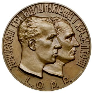 medal autorstwa Olgi Niewskiej z 1935 r. wybity z okazji zawodów Gordon-Bennetta w Warszawie na zlecenie  Ligi Obrony Przeciwpowietrznej