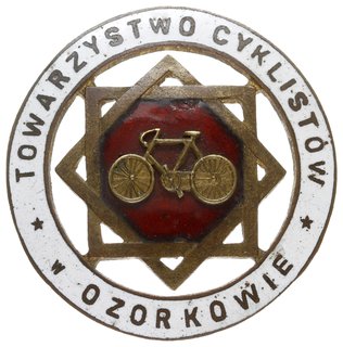Odznaka Towarzystwa Cyklistów w Ozorkowie, dwuczęściowa, wykonana w tombaku 36.5 mm, emalia czerwona nieznacznie uszkodzona, na gładkiej stronie odwrotnej i na nakrętce punca S. Bobkowicz (Łódź), Towarzystwo Cyklistów działało od 1911 roku