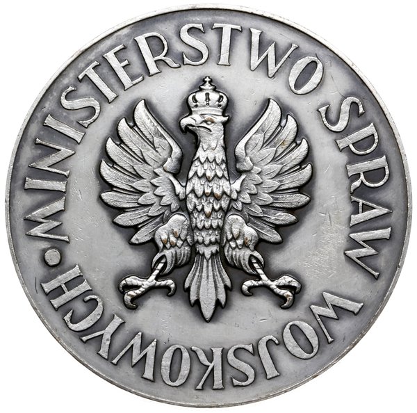 medal z 1938 roku autorstwa Stefana Rufina Koźbielewskiego wydany przez Ministerstwo Spraw Wojskowych jako nagroda Za Konia Remontowego”