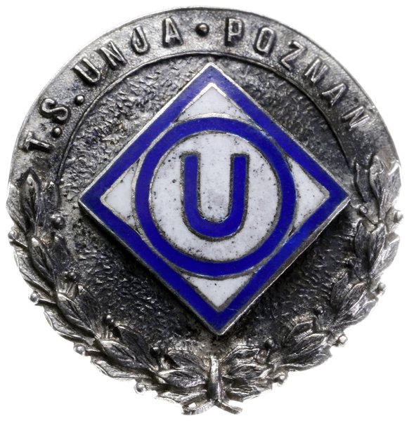 odznaka Towarzystwa Sportowego Unia, Poznań, wykonanie F. Szczepański Łódź, srebro, biala i niebieska emalia, średnica 22 mm, Towarzystwo, pod początkową nazwą Klub Sportowy, powstało w 1915 roku. W 1917 roku została zmieniona nazwa na Towarzystwo Sportowe Unia Poznań