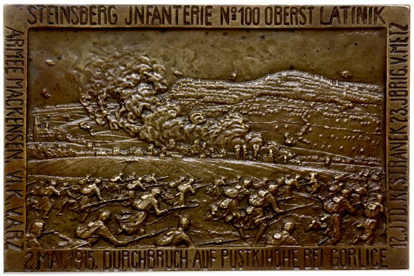 jednostronna plakieta autorstwa J. Walacha wykonana z okazji przełamania fortyfikacji rosyjskiej na wzgórzu Pustki koło Gorlic (w walkach tych po obu stronach poległo wielu Polaków)