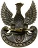 Orzeł do czapki, 1916, Kraków; Orzeł z rozpostartymi skrzydłami, stojący na tarczy amazonek, w tar..
