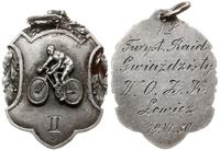 odznaka pamiątkowa 1930, Kartusz, na kórym cykli