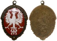 Polska, medalik w postaci ozdobionej tarczy z owalną częścią w środku z białym Orł..