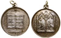 medalik religijny, Gołębica, niżej księga w któr
