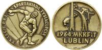 medal pamiątkowy 1964, Aw: Dyskobol na tle wscho