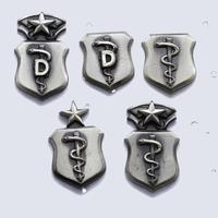 srebrne odznaki personelu medycznego Sił Zbrojny